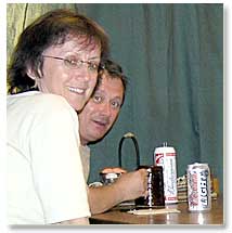 Hana and Mirek enjoying American beer with pizza and buffalo wings.